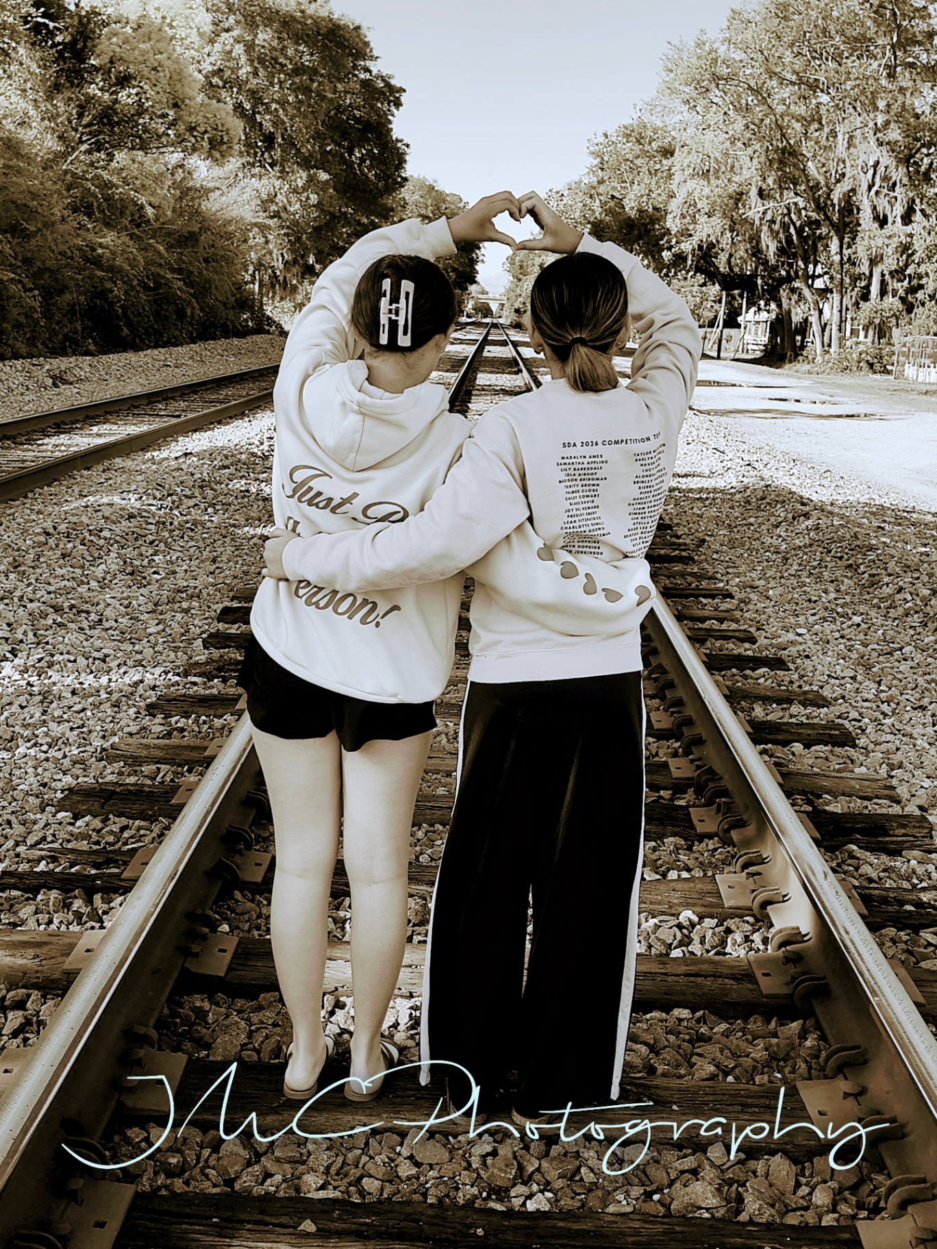Friends on the railroad tracks